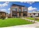 Beautiful contemporary home with a manicured front lawn, sleek design, and inviting curb appeal at 2010 Irving St, Denver, CO 80211