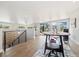 Bright living area with modern decor, railing and large windows at 2010 Irving St, Denver, CO 80211