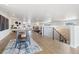 Spacious living area with a modern staircase and a small table set at 2010 Irving St, Denver, CO 80211