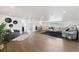 Spacious living room with hardwood floors, modern furniture, and stylish decor at 2010 Irving St, Denver, CO 80211