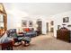 Comfortable living room with cozy seating, warm lighting, and decorative accents at 2091 Tate Ave, Fort Lupton, CO 80621