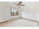 Bedroom featuring natural light, carpet and baseboard heating at 8588 E Costilla Ave, Centennial, CO 80112