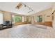 Large bonus room featuring vaulted ceiling, tiled flooring, and large windows at 8588 E Costilla Ave, Centennial, CO 80112