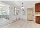 Bright dining area featuring tile flooring and natural light from multiple windows at 8588 E Costilla Ave, Centennial, CO 80112
