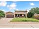 Charming two-story home with a well-manicured lawn and inviting curb appeal at 8588 E Costilla Ave, Centennial, CO 80112