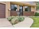 Inviting entryway to home at 8588 with decorative plants and a well-maintained walkway at 8588 E Costilla Ave, Centennial, CO 80112