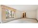 Bright and spacious living room featuring a large bay window at 8588 E Costilla Ave, Centennial, CO 80112