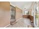 Mudroom with tile floors, offering a transitional space from the outdoors at 8588 E Costilla Ave, Centennial, CO 80112