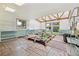 Large sunroom with skylights, tiled flooring and lots of space for plants at 8588 E Costilla Ave, Centennial, CO 80112