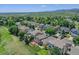 Community view showing the property and neighborhood with landscape, homes and distant mountains at 14191 W Amherst Ave, Lakewood, CO 80228