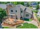 Aerial perspective showing deck, lawn and garden, and proximity to neighbors within a residential community at 14191 W Amherst Ave, Lakewood, CO 80228