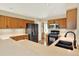 Well-equipped kitchen featuring stainless steel appliances and plenty of counter space for meal prep at 14191 W Amherst Ave, Lakewood, CO 80228