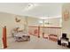 Cozy loft area with comfortable seating, offering a relaxing space with views at 14191 W Amherst Ave, Lakewood, CO 80228