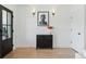 Elegant entryway with stylish decor, modern lighting, and hardwood floors at 1647 N Osceola St, Denver, CO 80204