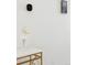 Interior shot showcasing a modern thermostat, tablet, and decor with a clean white wall at 1647 N Osceola St, Denver, CO 80204