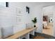 Bright entryway featuring shiplap walls, bench seating, and stylish decor at 1374 S Vine St, Denver, CO 80210