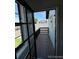 This balcony offers a private outdoor retreat with wood flooring and railings, perfect for relaxation and enjoyment of the view at 4362 Denmark Ct, Denver, CO 80239
