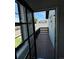 Private balcony with wood decking and black railing offers outdoor space at 4362 Denmark Ct, Denver, CO 80239