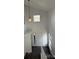 Welcoming foyer with a high ceiling, staircase, and natural light, creating an open and airy entrance at 4362 Denmark Ct, Denver, CO 80239