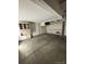 Functional garage with built in storage and room for vehicles and projects at 4362 Denmark Ct, Denver, CO 80239