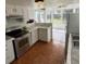Well-equipped kitchen with stainless steel appliances and a sunny breakfast nook, perfect for cooking and casual dining at 4362 Denmark Ct, Denver, CO 80239