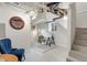 Finished basement featuring painted floors, exposed ducts and modern lighting at 3953 Tejon St, Denver, CO 80211