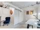 Finished basement with painted floors, exposed ceiling ducts, and built in storage at 3953 Tejon St, Denver, CO 80211