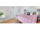 Comfortable bedroom features stylish decor and hardwood floors at 3953 Tejon St, Denver, CO 80211