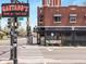 Charming corner restaurant building, Gaetano's, with dine in and take out signage and a red brick facade at 3953 Tejon St, Denver, CO 80211