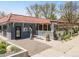 Necto restaurant exterior showcasing a charming patio with pergola, lovely landscaping, and a red tile roof at 3953 Tejon St, Denver, CO 80211