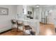 Stylish kitchen includes quartz counters, stainless appliances, and a breakfast bar at 3953 Tejon St, Denver, CO 80211