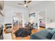 Stylish living room featuring hardwood floors, modern furniture, and an open floor plan at 3953 Tejon St, Denver, CO 80211
