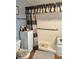 Bright bathroom featuring updated shower with glass door, vanity and commode at 8501 W 52Nd Ave, Arvada, CO 80002