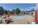 Enjoy the community pool with lounge seating, perfect for relaxing and soaking up the sun at 10150 E Virginia Ave # 18-302, Denver, CO 80247