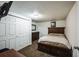 Comfortable bedroom features carpeted floors, a closet with sliding doors, and standard sized bed at 327 N 12Th Ave, Brighton, CO 80601