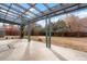 Spacious backyard with a pergola, patio, and well-maintained lawn, ideal for outdoor living at 211 Newport St, Denver, CO 80220