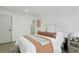 Bright bedroom with a large window, stylish decor, and a cozy atmosphere at 211 Newport St, Denver, CO 80220