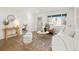 Cozy living room with hardwood floors, natural light, and comfortable seating, perfect for relaxation and entertaining at 211 Newport St, Denver, CO 80220