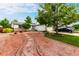 Charming home with a unique xeriscaped front yard, mature trees, and a welcoming two-car garage at 4520 E 112Th Pl, Thornton, CO 80233