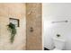 Modern bathroom features tiled shower, sleek fixtures, and a clean, minimalist design at 5993 Oneida St, Commerce City, CO 80022