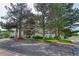 A beautiful building with mature trees and well-maintained landscaping, enhancing its curb appeal at 17595 E Mansfield Ave # 1331L, Aurora, CO 80013