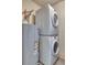 This dedicated laundry space offers efficient stackable appliances and practical design, maximizing convenience at 17595 E Mansfield Ave # 1331L, Aurora, CO 80013
