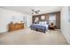 Relaxing main bedroom suite with ceiling fan and ensuite bathroom at 2410 Morningview Ln, Castle Rock, CO 80109