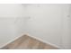 Small walk-in closet with carpet flooring and wire shelving at 2410 Morningview Ln, Castle Rock, CO 80109