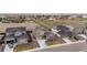 Aerial view of the community showcasing homes with manicured lawns and neighborhood streets at 14651 Dahlia Way, Thornton, CO 80602