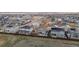 An aerial view of a neighborhood featuring modern homes with well-maintained fences and landscaping at 14651 Dahlia Way, Thornton, CO 80602
