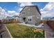 Landscaped backyard with a patio, grill, and plenty of space for outdoor activities at 14651 Dahlia Way, Thornton, CO 80602