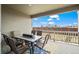 Inviting covered patio with a dining table and chairs, perfect for outdoor entertaining at 14651 Dahlia Way, Thornton, CO 80602