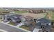 An aerial view showing several modern two-story homes with well-kept yards in a suburban neighborhood at 14651 Dahlia Way, Thornton, CO 80602