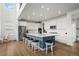 Bright, contemporary kitchen with stainless steel appliances, a large island and plenty of cabinet space at 14651 Dahlia Way, Thornton, CO 80602